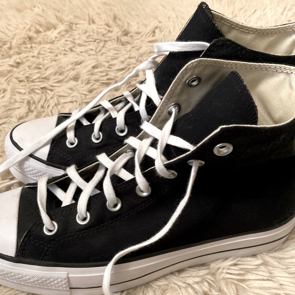 Gently used black platform converse, size women’s 10.